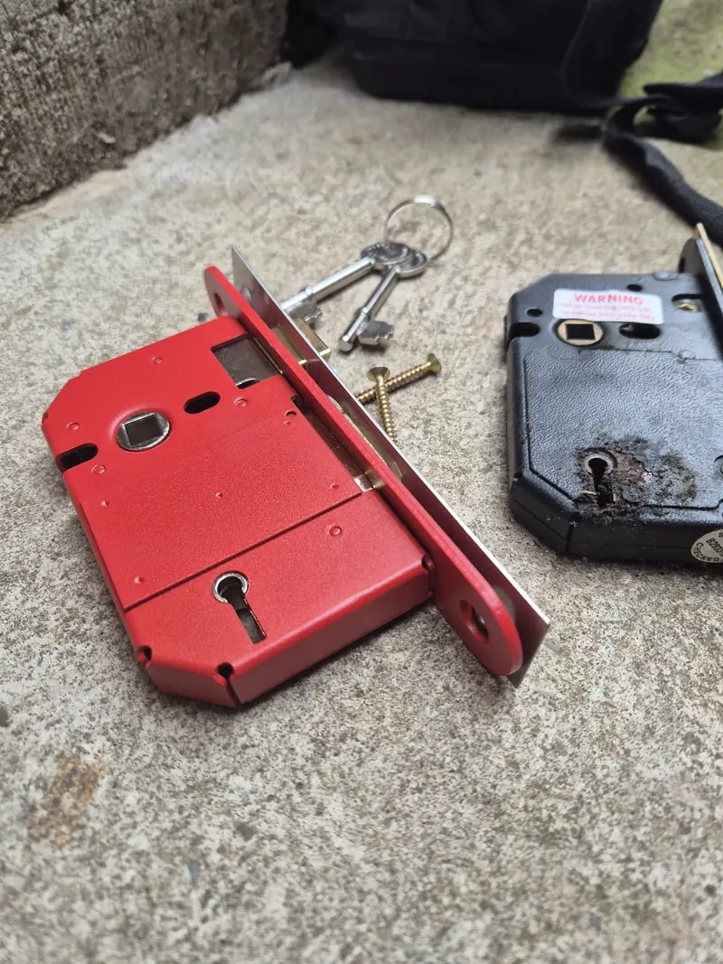 Worn wooden door lock replaced when repair was no longer the sensible option