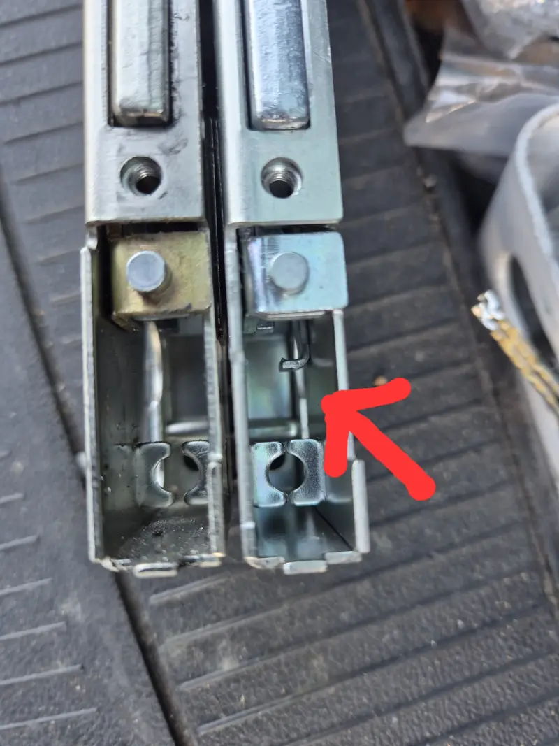 Old and new uPVC lock mechanisms compared during a repair in Leeds